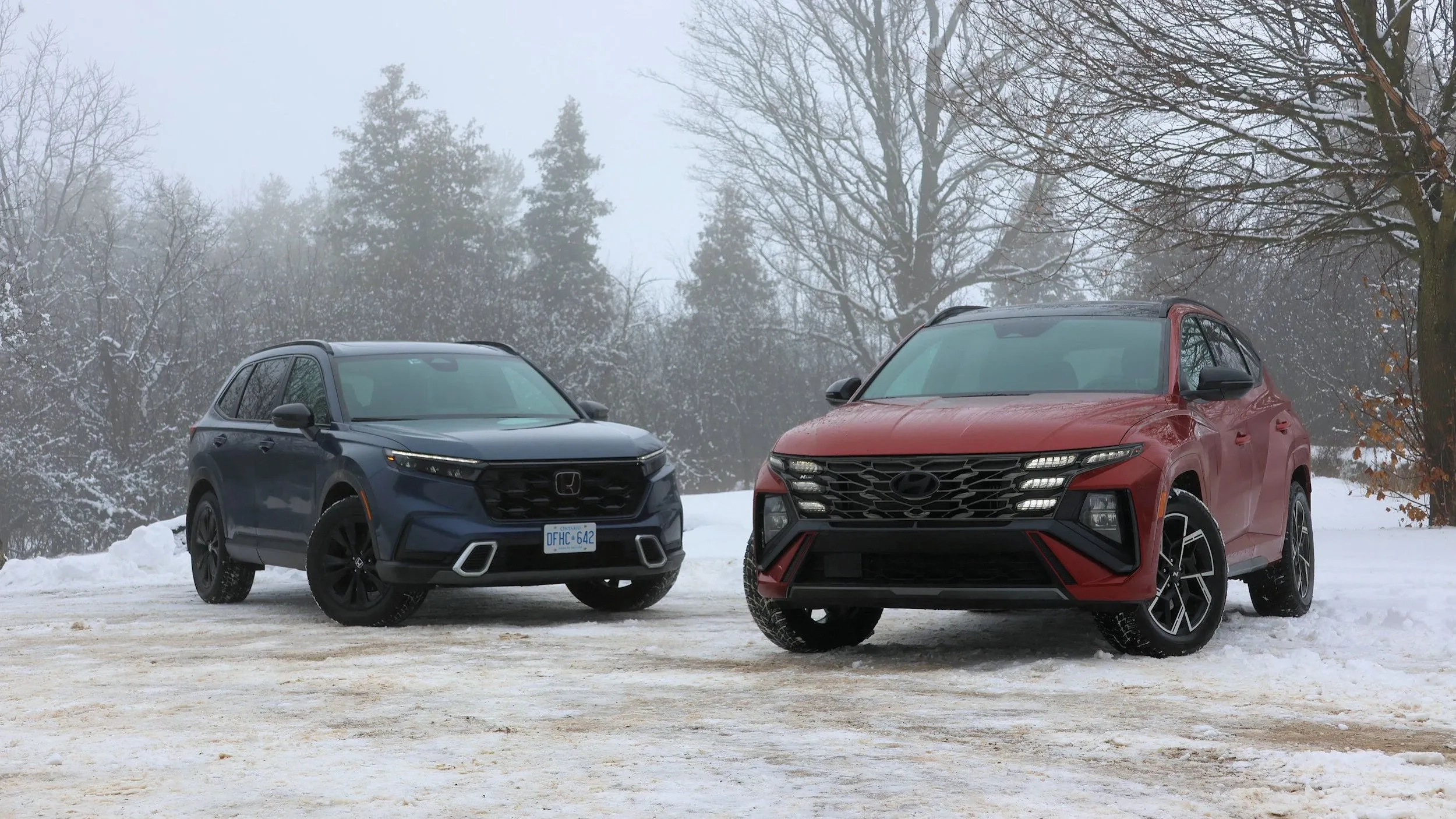 2026 Honda CR V Vs Hyundai Tucson Hybrid SUV Comparison Reviews Driving