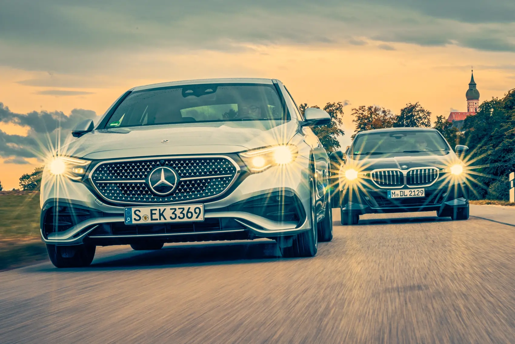 2026 BMW 5 Series vs Mercedes E Class review